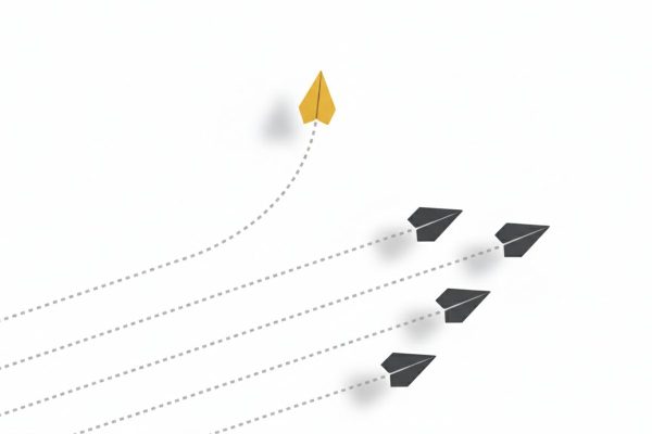 تصویر موشک کاغذی زرد در حال تغییر مسیر از گروه، نماد شکستن الگوهای فکری منفی و یافتن مسیر منحصر به فرد در افزایش اعتماد به نفس.